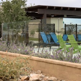 glass and wrought iron fence combo