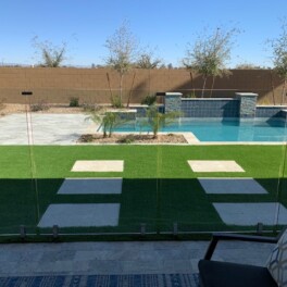 glass fence installed as pool safety barrier