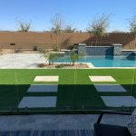 glass fence installed as pool safety barrier