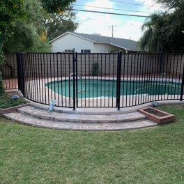 wrought iron fence with curve