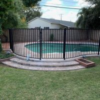 wrought iron fence with curve