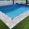 pool safety net secured to bricks