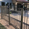 iron pool safety gate on fence