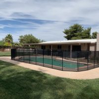 rounded rectangular mesh pool fence installation